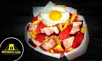 CHANCHIPAPA Papas fritas chorizo Chancho al cilindro y huevo 2 Bebidas de chicha