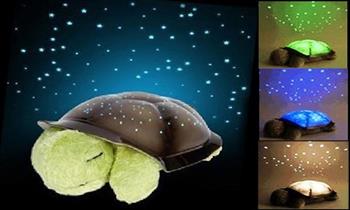 Tortuga peluche con proyector de luces musical pilas