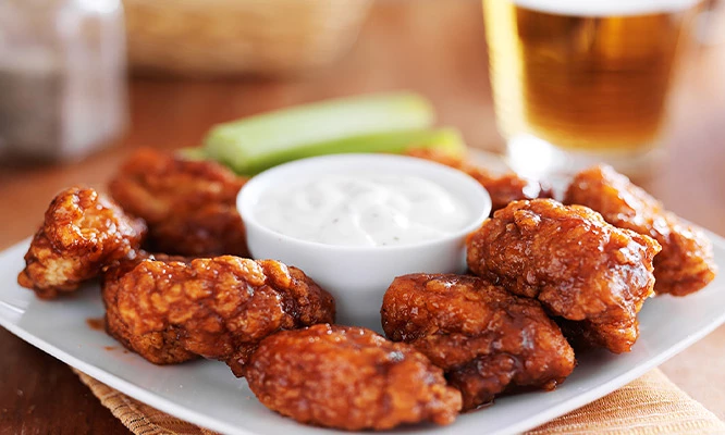 Barra libre de alitas + 1 bebida a elección en Restaurante Cevicheria Tacu Mar