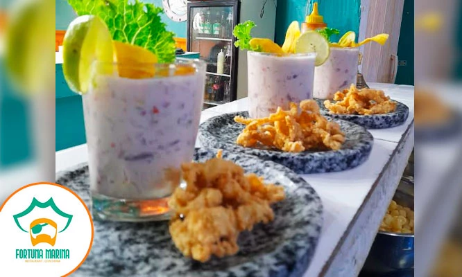 Ceviche + Arroz con Marisco + Chicharrón mixto + Causa de pulpa de cangrejo+ leche de tigre y 2 cervezas