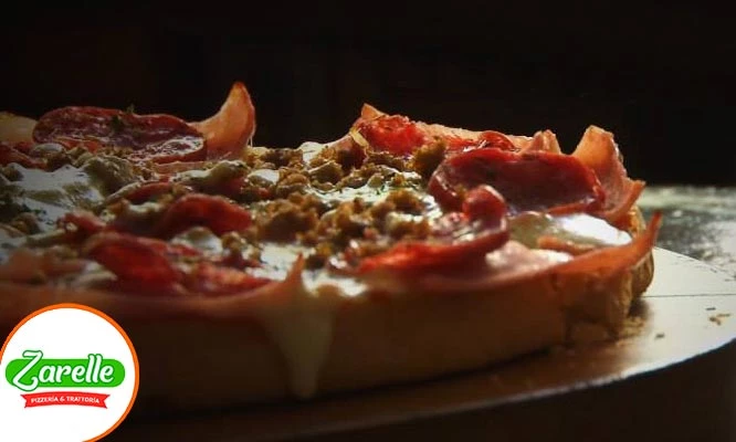 Pizza familiar a elección + pan al ajo + gaseosa de 1.5 L